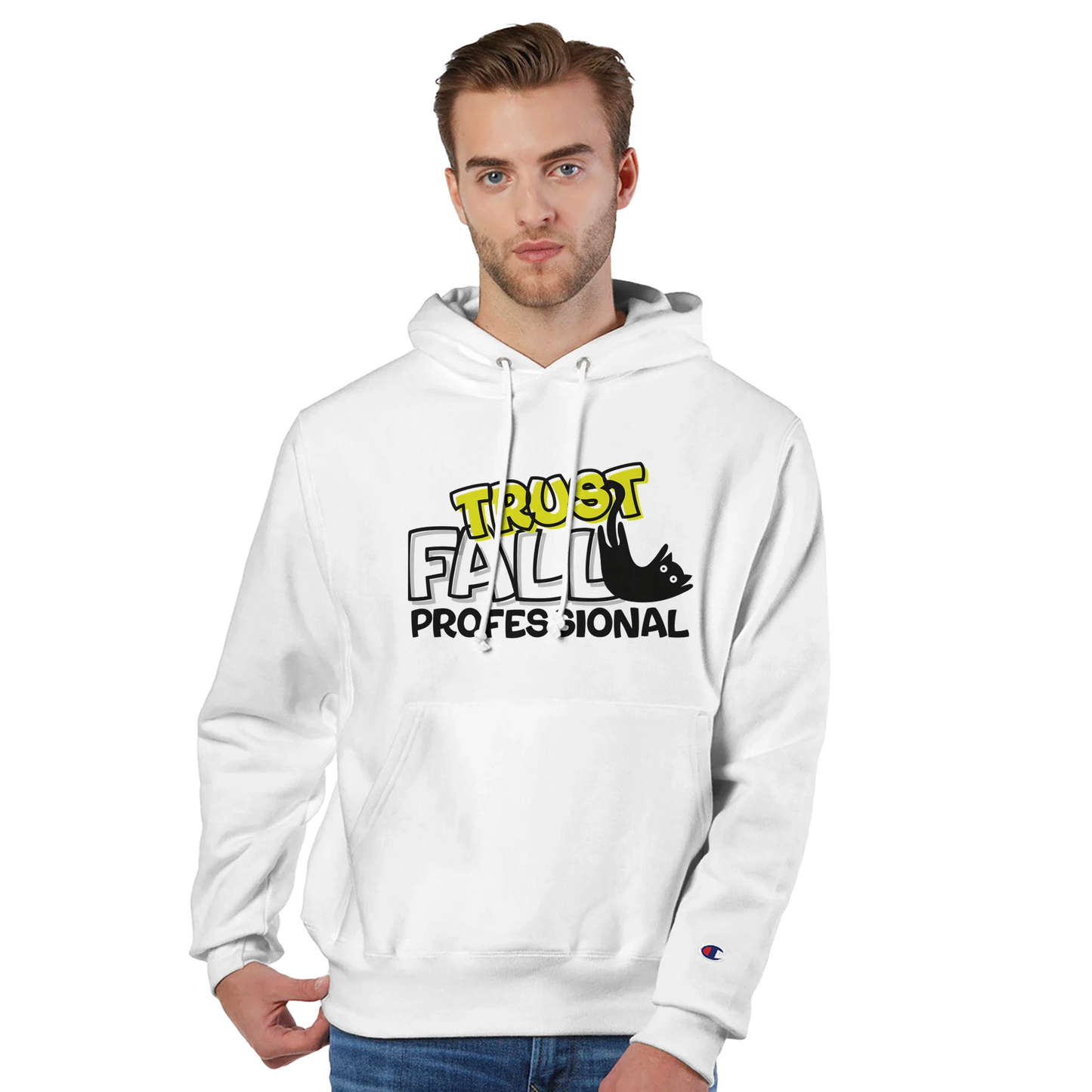Model wearing a white Champion pullover hoodie with the “Trust Fall Professional” graphic on the front, featuring bold yellow and black lettering and a falling cat illustration.
