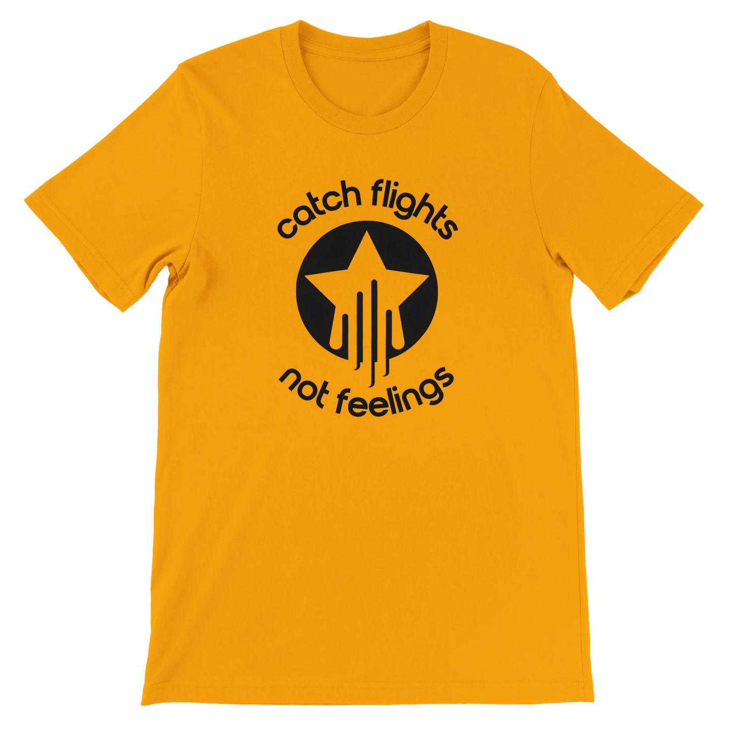 Gold unisex t-shirt with a bold black graphic that reads “catch flights not feelings” curved around a star and streak icon, printed on the chest.