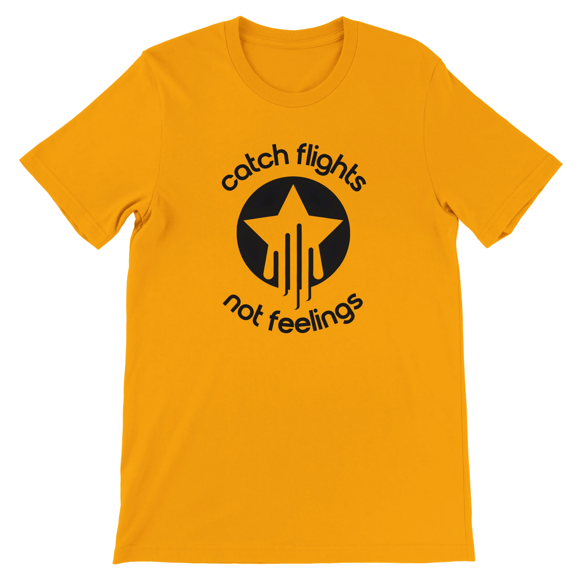 Gold unisex t-shirt with a bold black graphic that reads “catch flights not feelings” curved around a star and streak icon, printed on the chest.