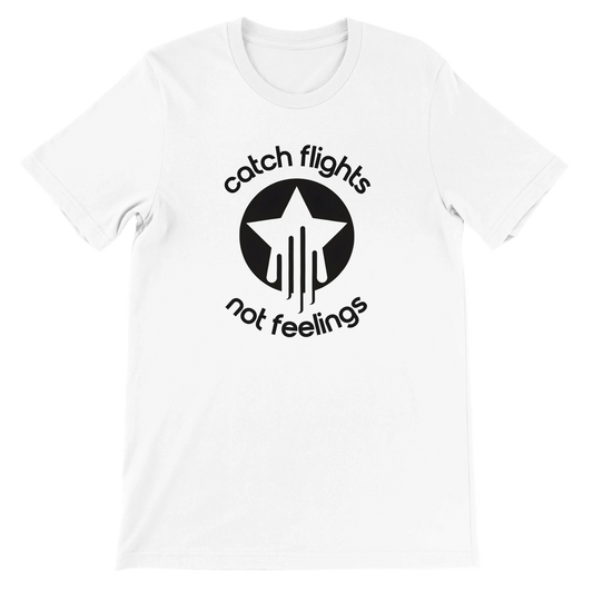 White unisex t-shirt with a bold black graphic that reads “catch flights not feelings” curved around a star and streak icon, printed on the chest.