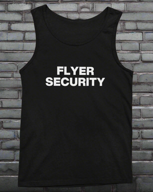 Flat lay of a vintage black unisex tank top with bold white “FLYER SECURITY” text, displayed against a dark brick wall with subtle purple neon lighting for a bold, edgy aesthetic.